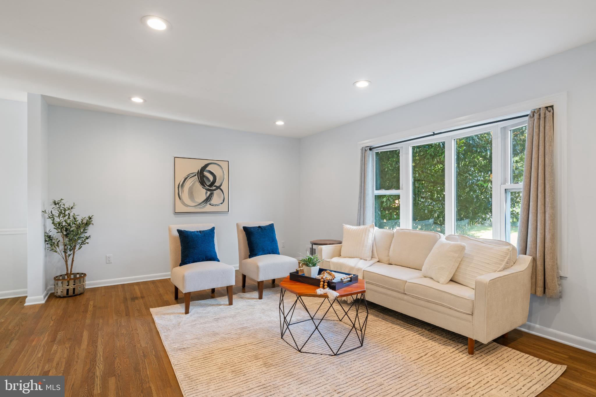 7105 Galgate Drive Springfield, VA 22152 - Photo 16 of 36 a living room with furniture and a large window