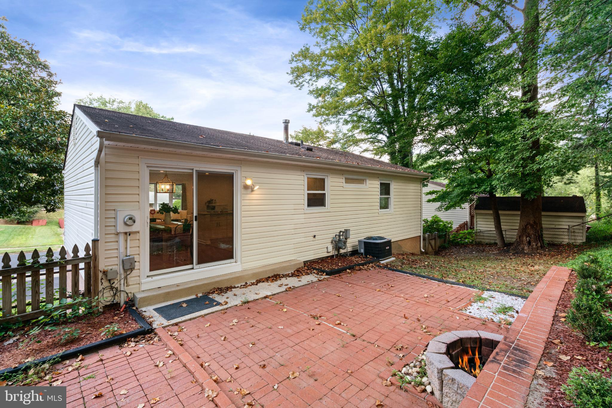 7105 Galgate Drive Springfield, VA 22152 - Photo 33 of 36 a backyard of a house with yard and outdoor seating