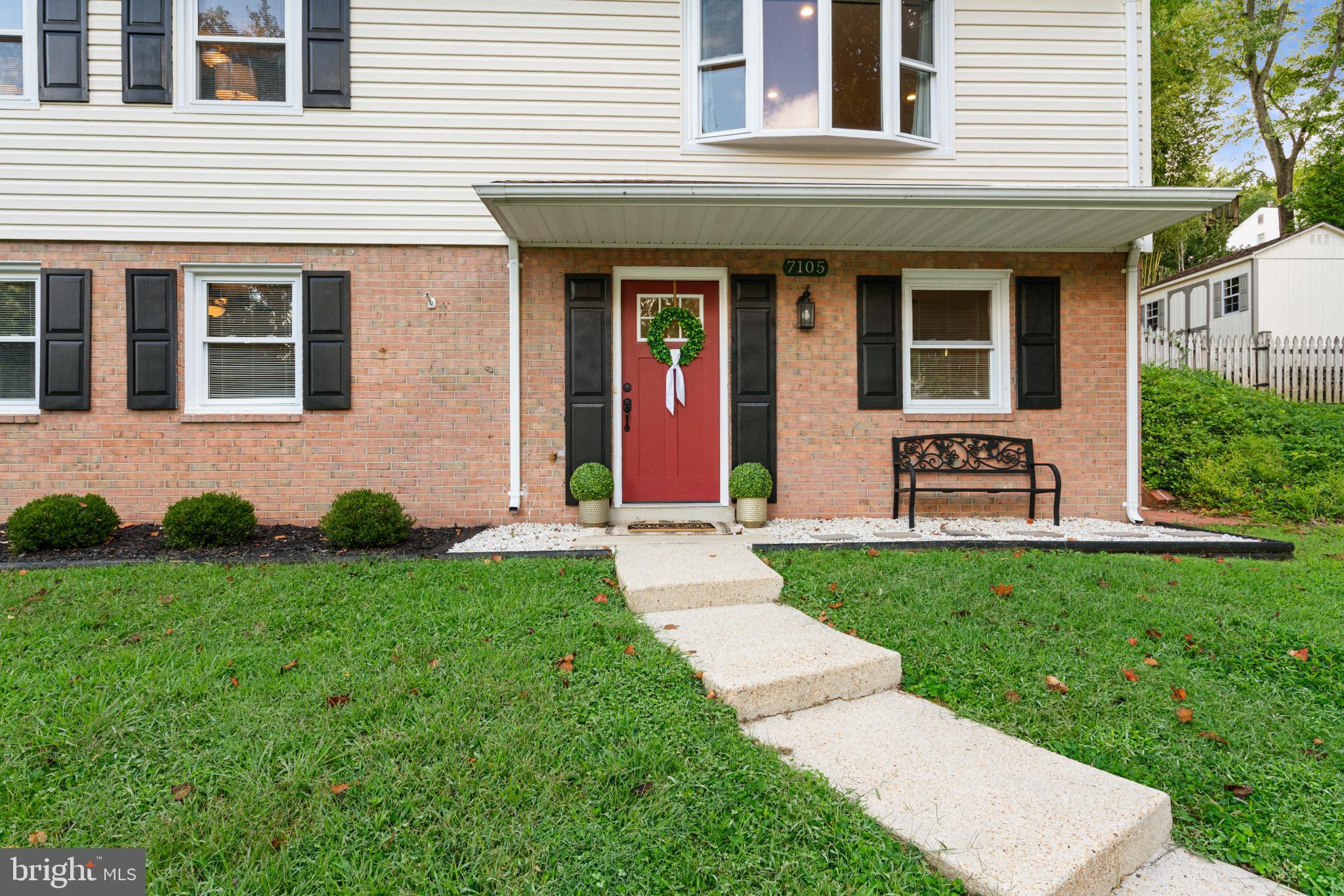7105 Galgate Drive Springfield, VA 22152 - Photo 36 of 36 a front view of a house with garden