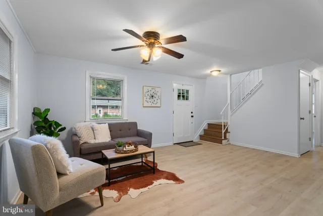 a living room with furniture and window
