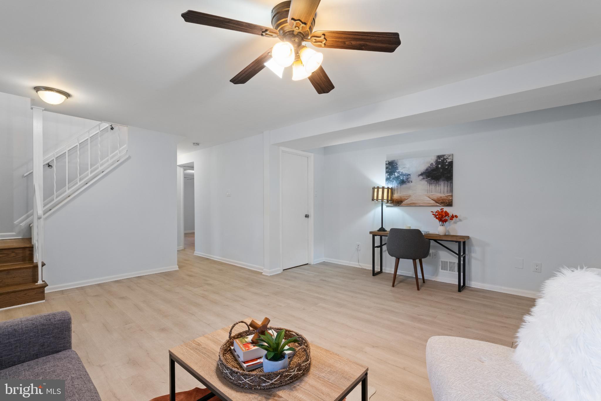7105 Galgate Drive Springfield, VA 22152 - Photo 6 of 36 a living room with furniture and a dining table