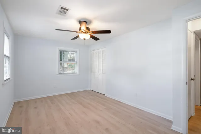 a view of a big room with carpet