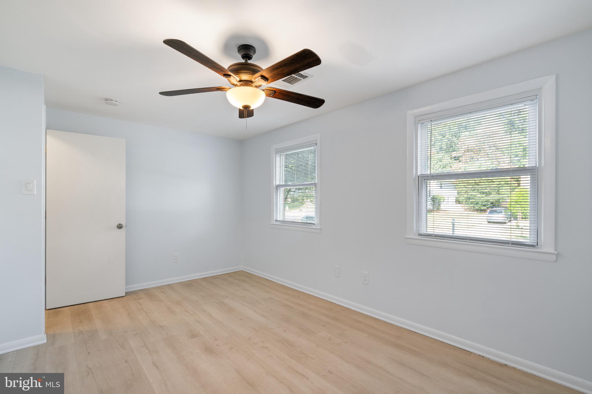 7105 Galgate Drive Springfield, VA 22152 - Photo 8 of 36 a view of an empty room with a window