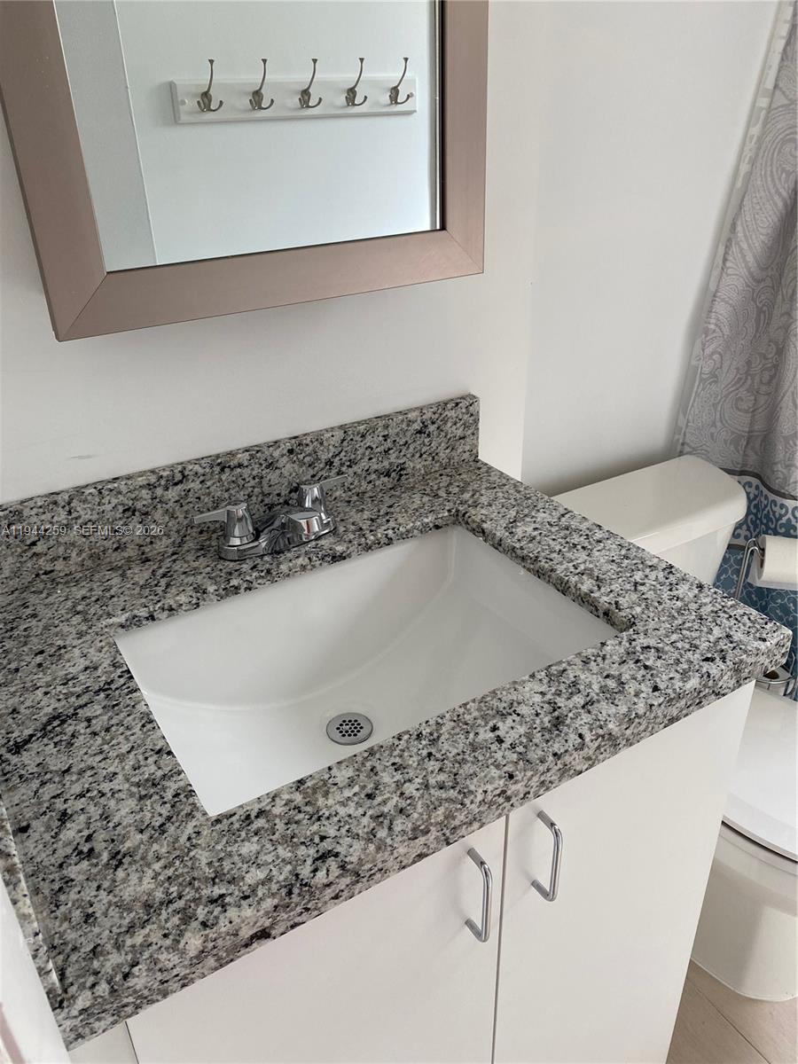 35 Southwest 21st Avenue, Unit 4 Miami, FL 33135 - Photo 7 of 8 a view of a sink in a bathroom