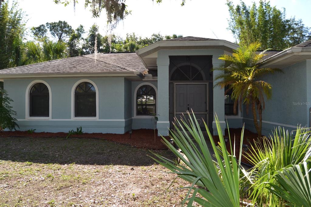 4314 Concert Street Port Charlotte, FL 33948 - Photo 1 of 27 a view of outdoor space and yard