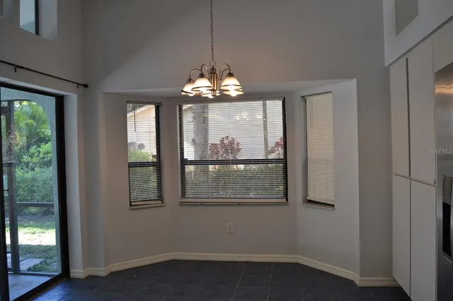 a kitchen with stainless steel appliances a white cabinets and a sink
