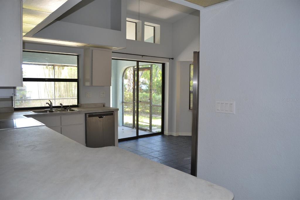 4314 Concert Street Port Charlotte, FL 33948 - Photo 16 of 27 a view of a kitchen with a sink and a window