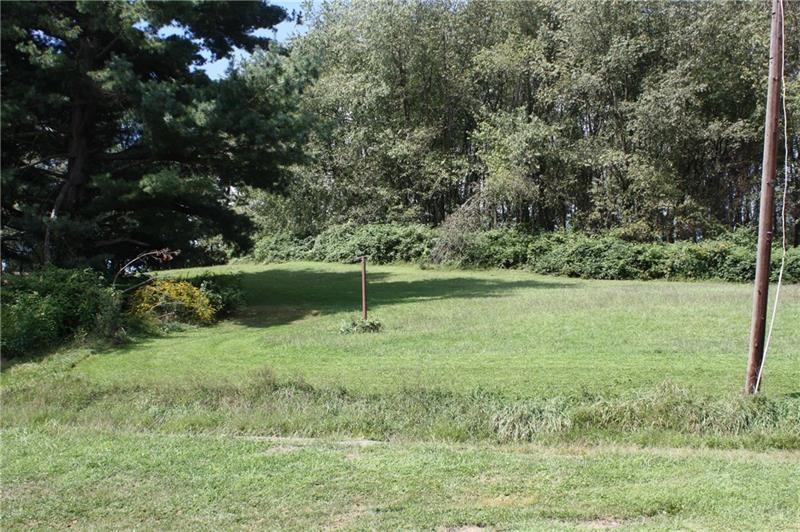 25 Moore Lane Cecil, PA 15321 - Photo 3 of 25 a view of a yard with a tree