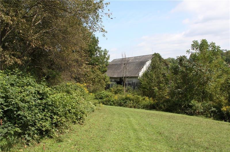 25 Moore Lane Cecil, PA 15321 - Photo 4 of 25 a view of a field with plants and trees