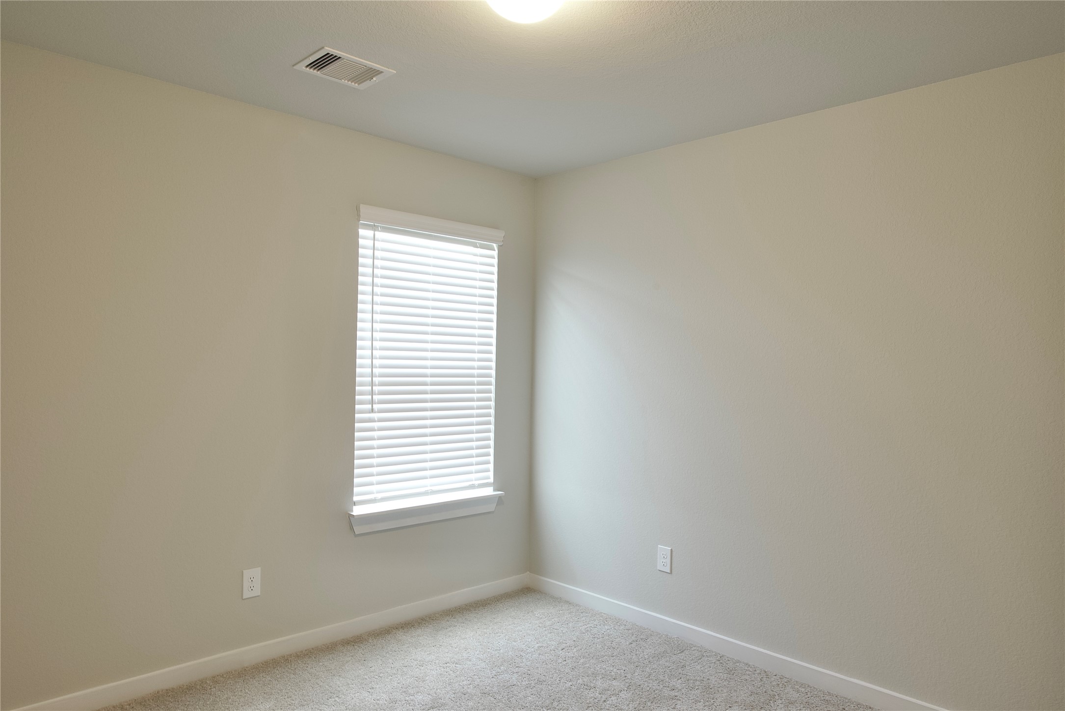 3207 Tilley Drive Rosenberg, TX 77471 - Photo 32 of 43 an empty room with a window