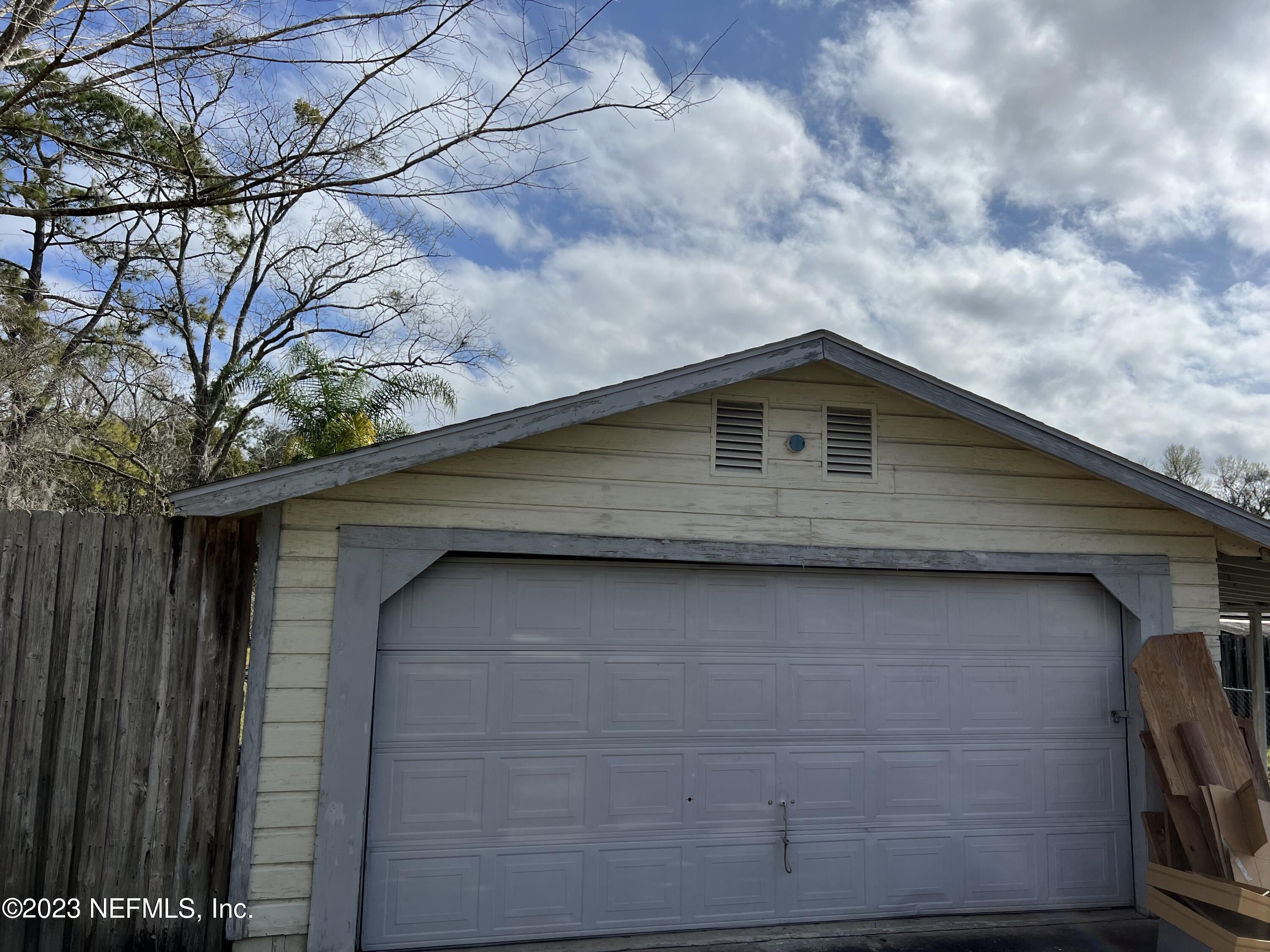 5933 Jammes Road Jacksonville, FL 32244 - Photo 3 of 15 2 Car Garage