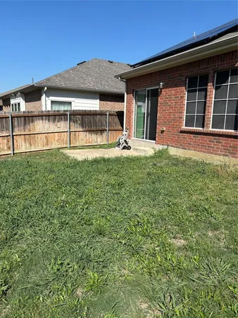 a house view with a garden space