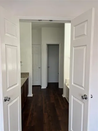 wooden floor in a hall with an entryway