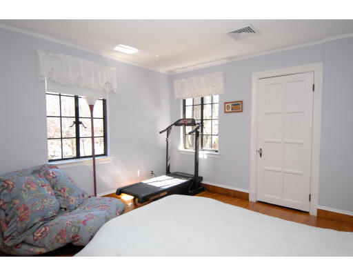 30 Sunset Road Newton, MA 02458 - Photo 17 of 26 a bedroom with a bed and a window
