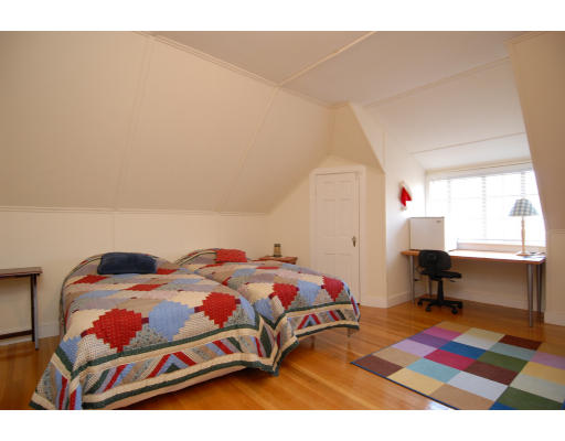 30 Sunset Road Newton, MA 02458 - Photo 20 of 26 a bedroom with a bed dresser and a window