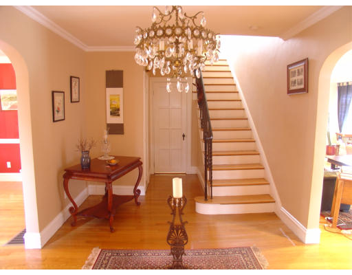 30 Sunset Road Newton, MA 02458 - Photo 2 of 26 a view of entryway and hall with wooden floor