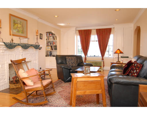 30 Sunset Road Newton, MA 02458 - Photo 3 of 26 a living room with furniture and a large window