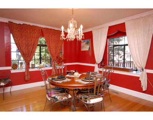 30 Sunset Road Newton, MA 02458 - Photo 9 of 26 a dining room with furniture a chandelier and wooden floor