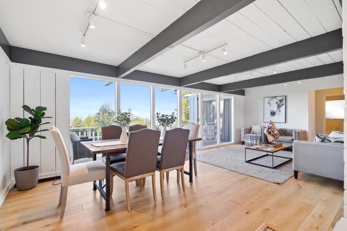 1384 Summit Road Berkeley, CA 94708 - Photo 5 of 31 a living room with furniture dining table and a potted plant