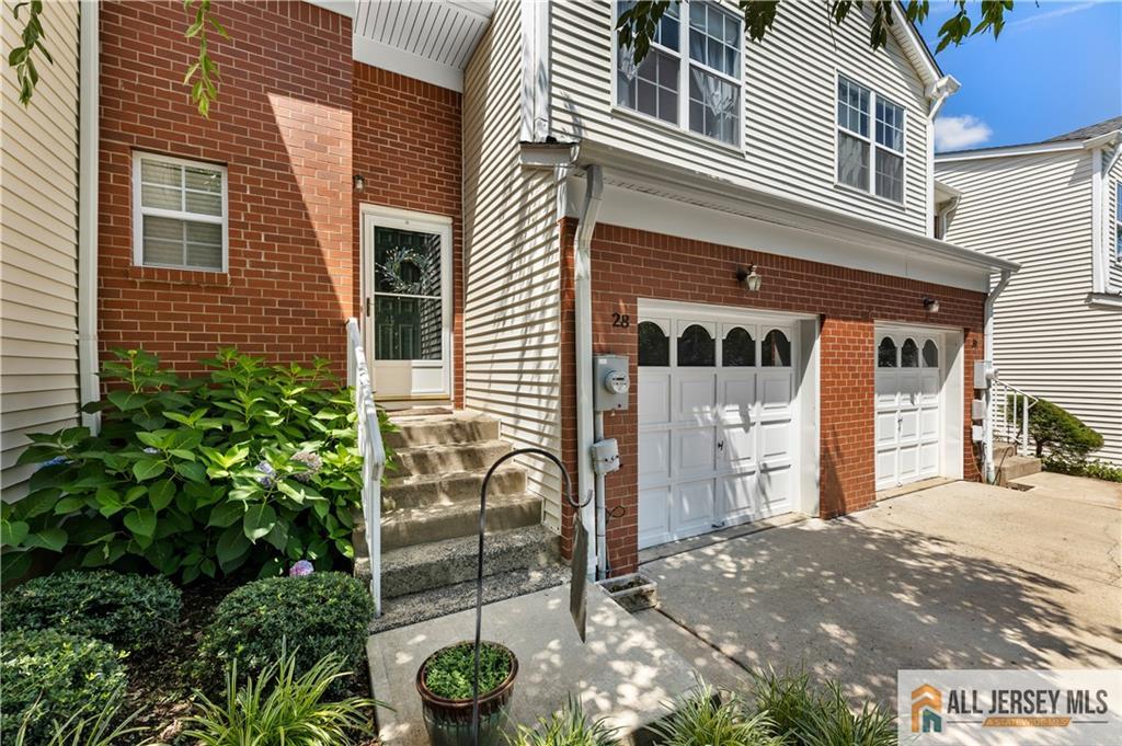 28 Garfield Way Princeton, NJ 08540 - Photo 27 of 39 a front view of a house with garden