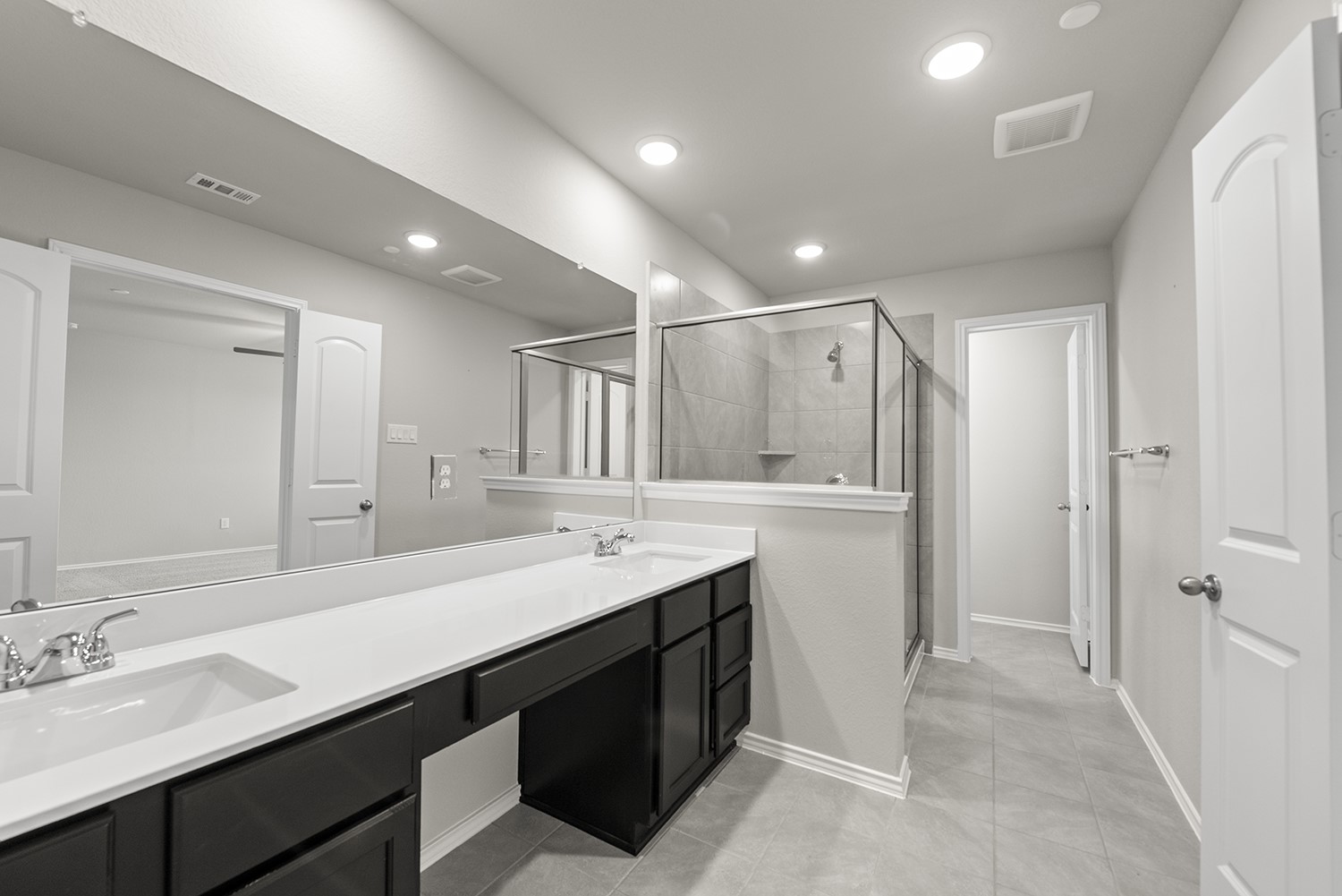 2782 Mariposa Crk Drive Rosharon, TX 77583 - Photo 14 of 25 a bathroom with a double vanity sink a and mirror