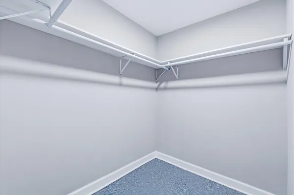 a view of a room with shelf on the wall