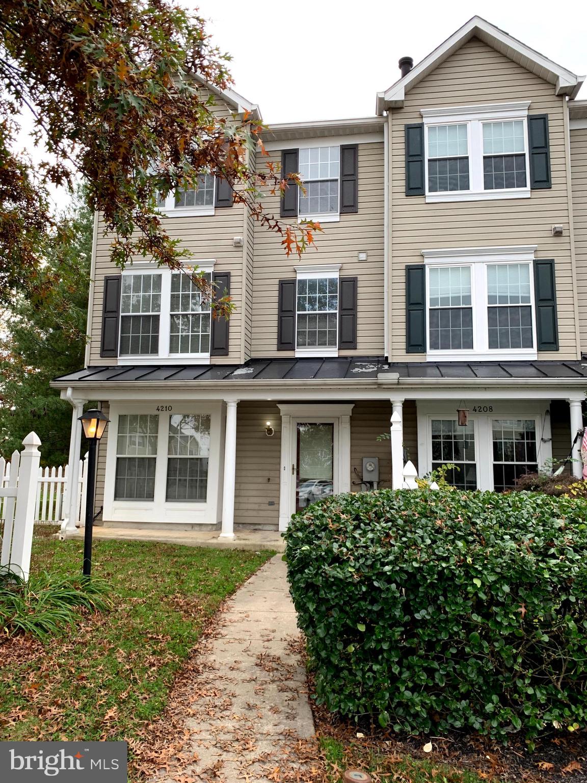 4210 Maple Path Circle, Unit 29 Baltimore, MD 21236 - Photo 2 of 10 front view of a house with a yard
