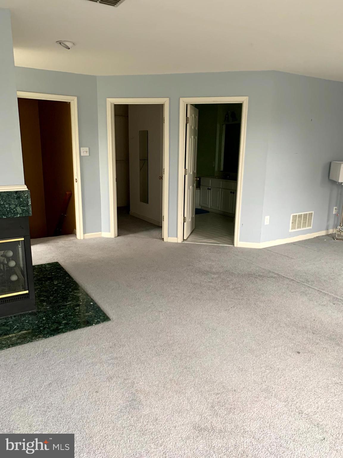 4210 Maple Path Circle, Unit 29 Baltimore, MD 21236 - Photo 10 of 10 a view of a big room with closet and mirror