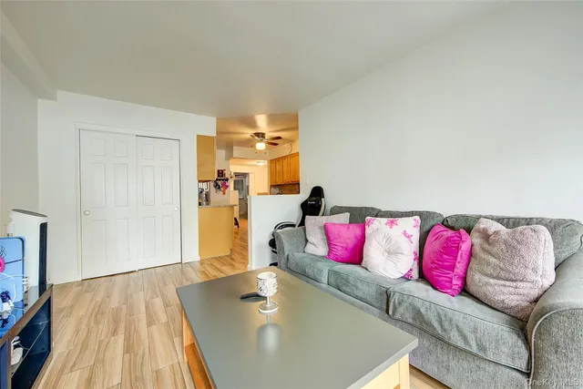 a bedroom with a bed and gym equipment