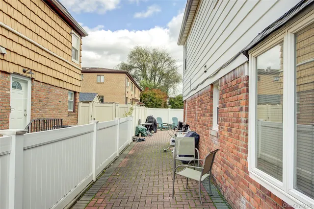 a view of a terrace with chairs