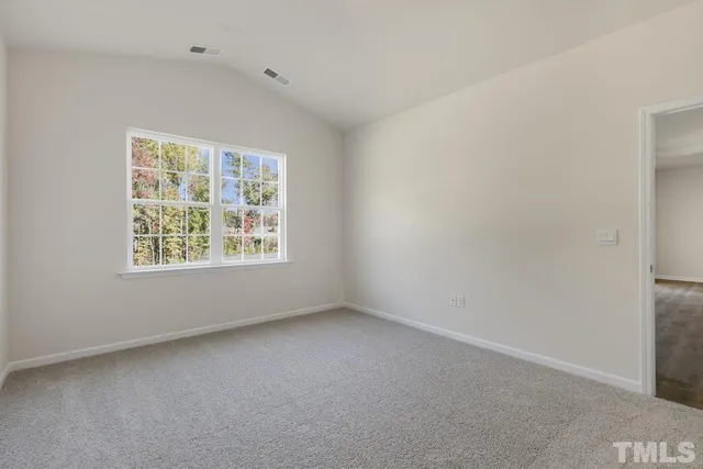 a bathroom with a shower sink and mirror