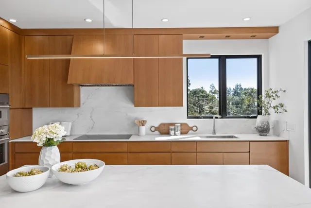 a bathroom with a sink and a window