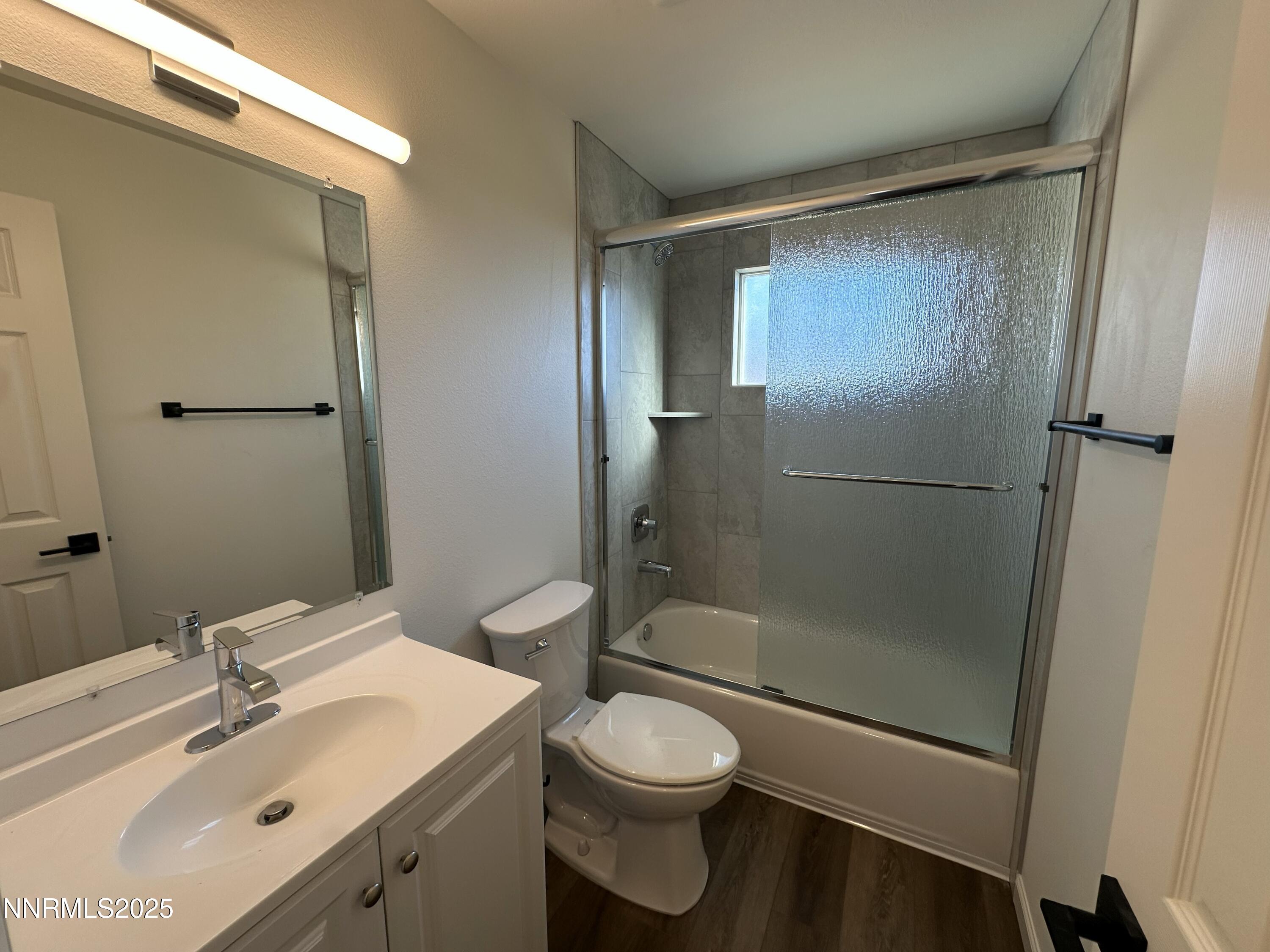 2370 Orange Lane Reno, NV 89502 - Photo 13 of 16 a bathroom with a sink toilet and shower