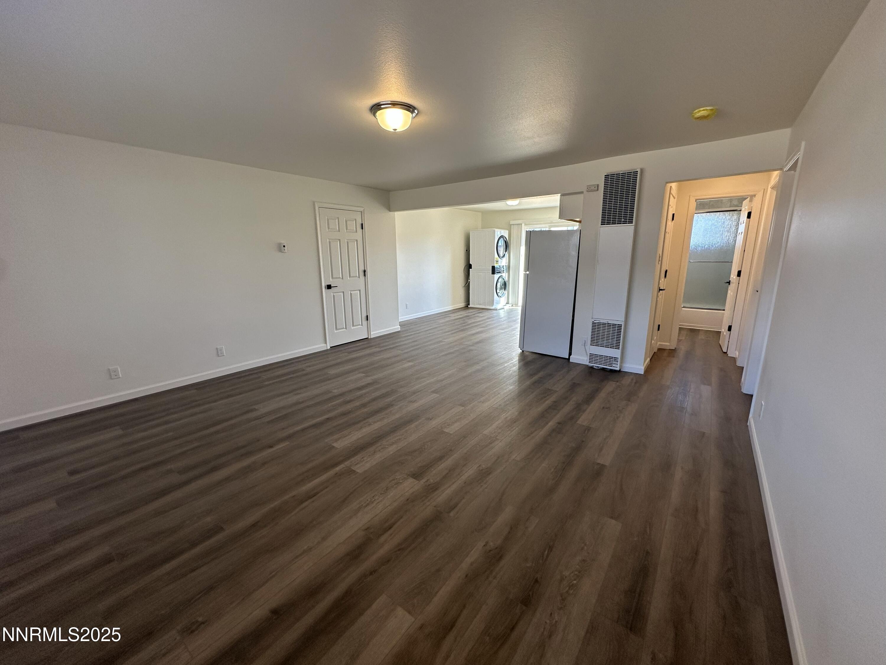 2370 Orange Lane Reno, NV 89502 - Photo 5 of 16 a view of an empty room with wooden floor