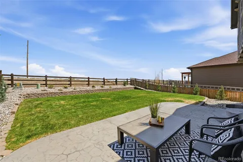 a view of outdoor space with garden and deck