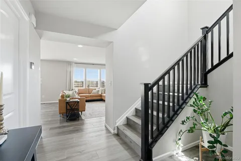 a view of entryway livingroom and hall