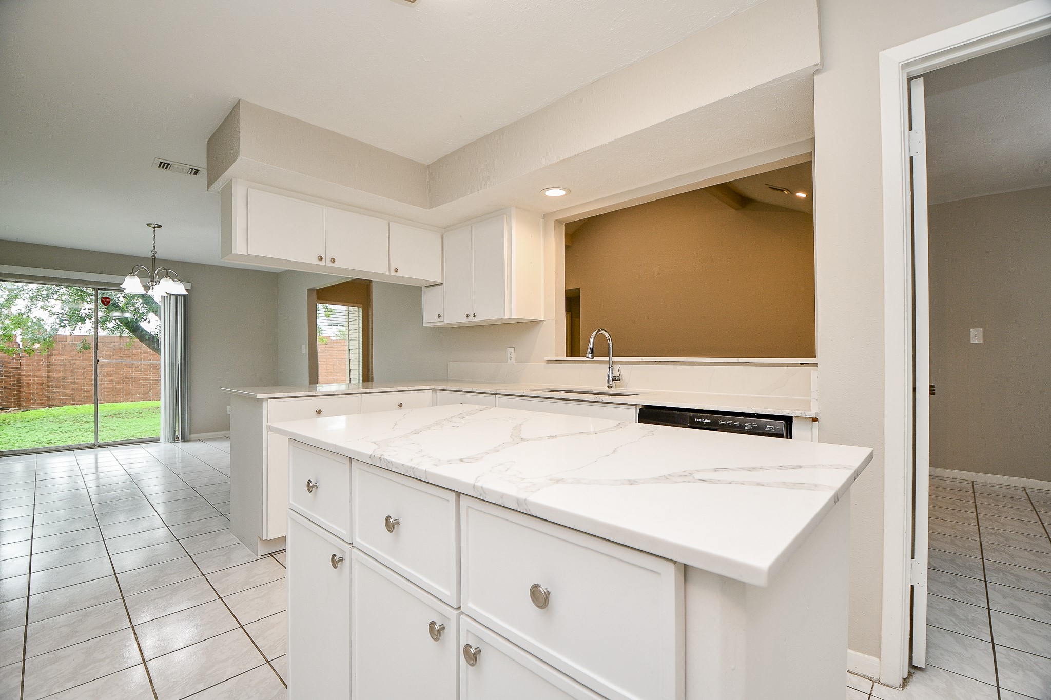 11411 Pepperdine Lane Houston, TX 77071 - Photo 20 of 31 a kitchen with a sink a counter top space and cabinets