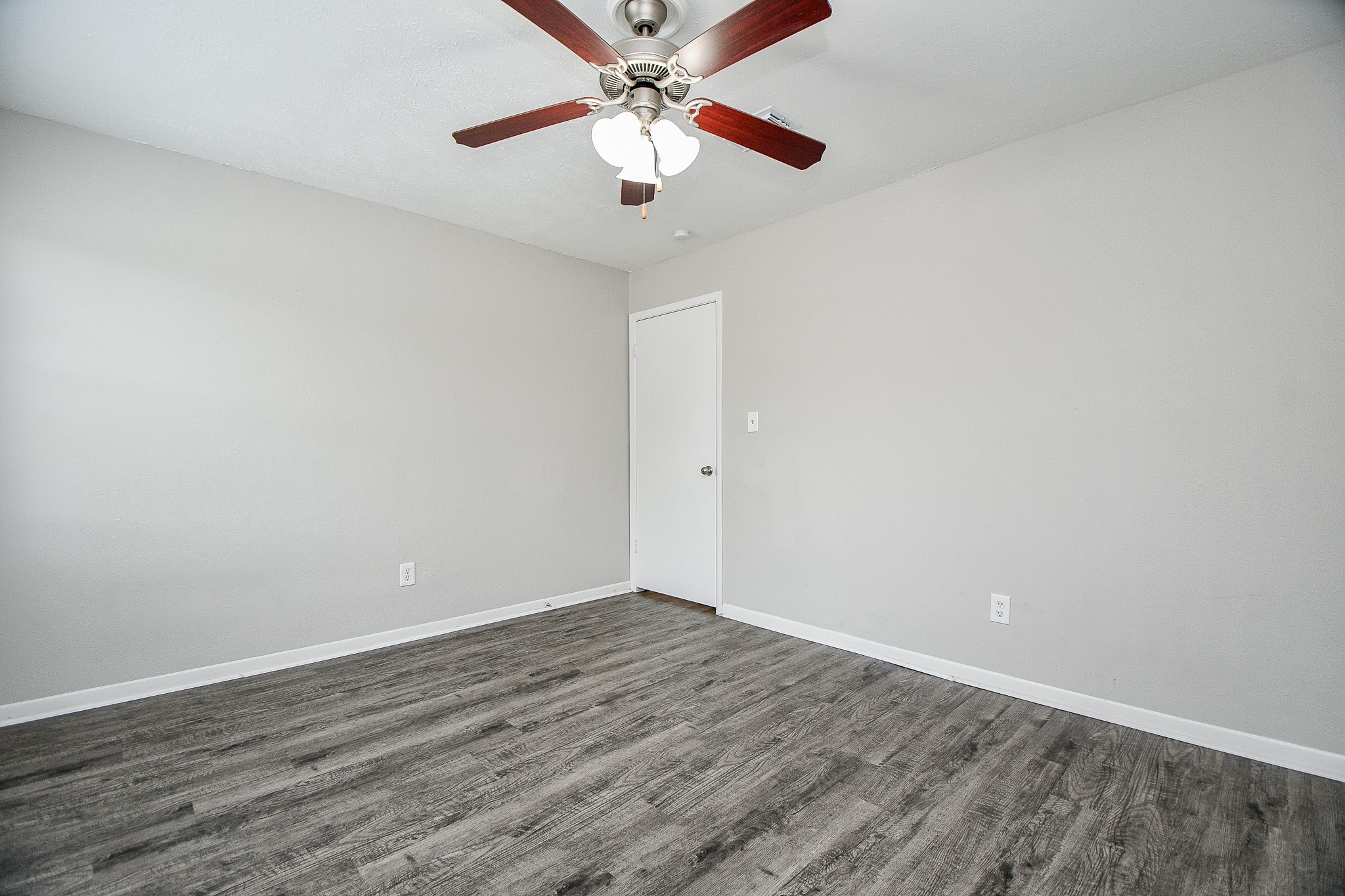 11411 Pepperdine Lane Houston, TX 77071 - Photo 23 of 31 a view of an empty room with wooden floor