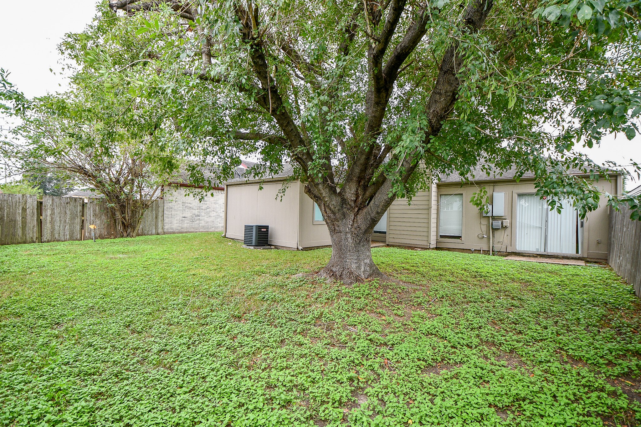 11411 Pepperdine Lane Houston, TX 77071 - Photo 30 of 31 a house with huge green field in front of it
