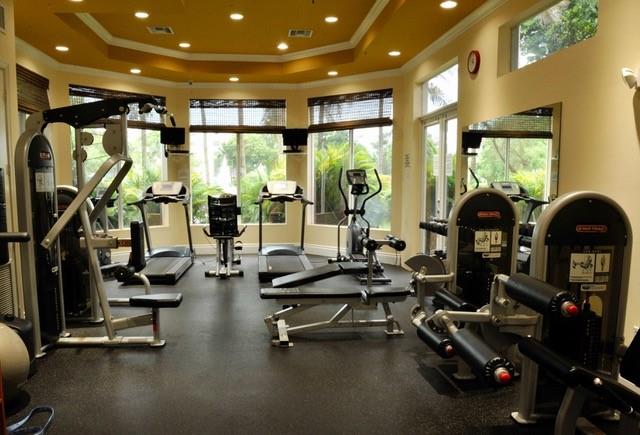 950 Lavers Circle, Unit F511 Delray Beach, FL 33444 - Photo 17 of 18 a view of a room with gym equipment