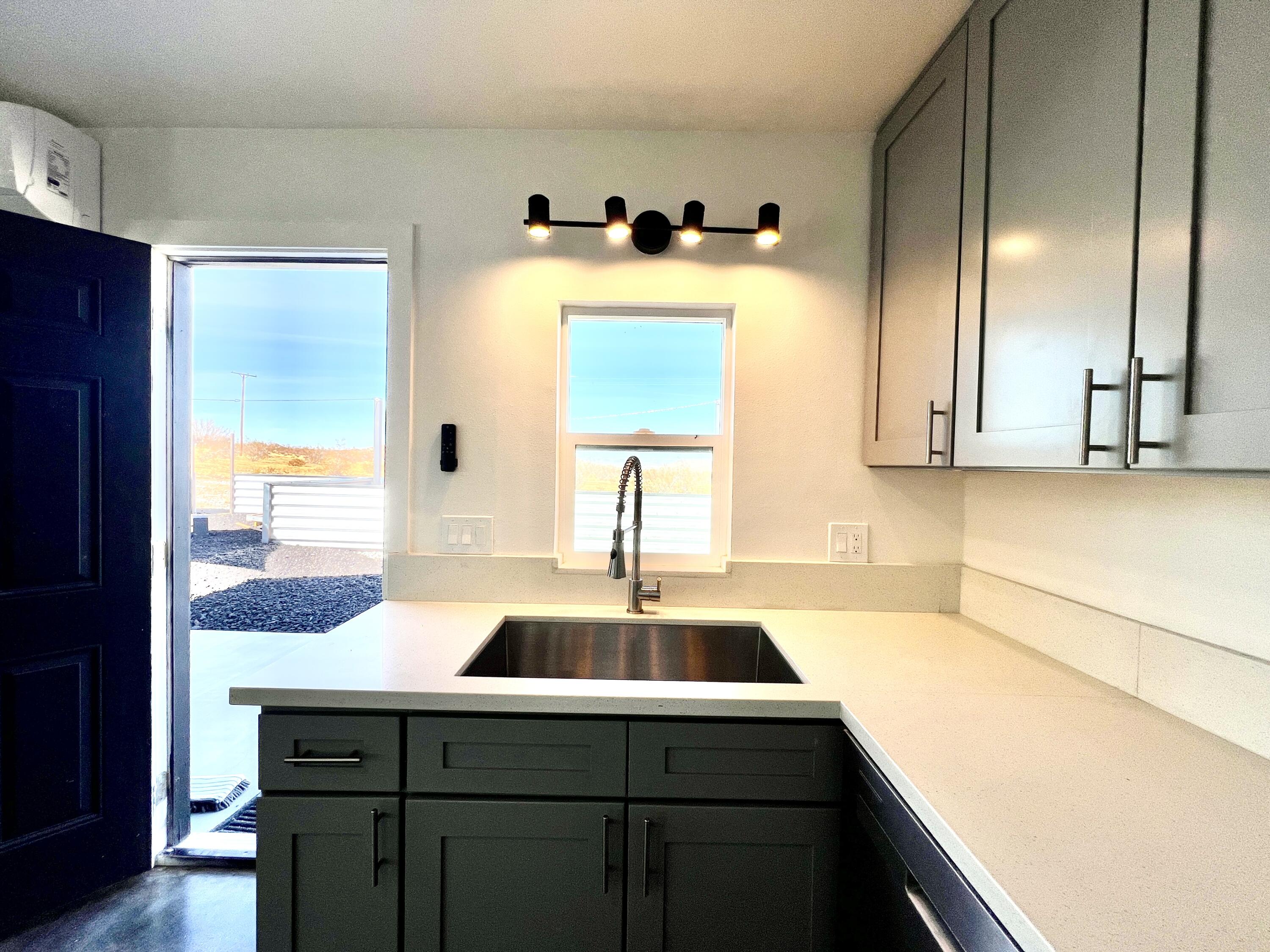 2774 Kickapoo Trail Landers, CA 92285 - Photo 11 of 51 a bathroom with a sink and a mirror