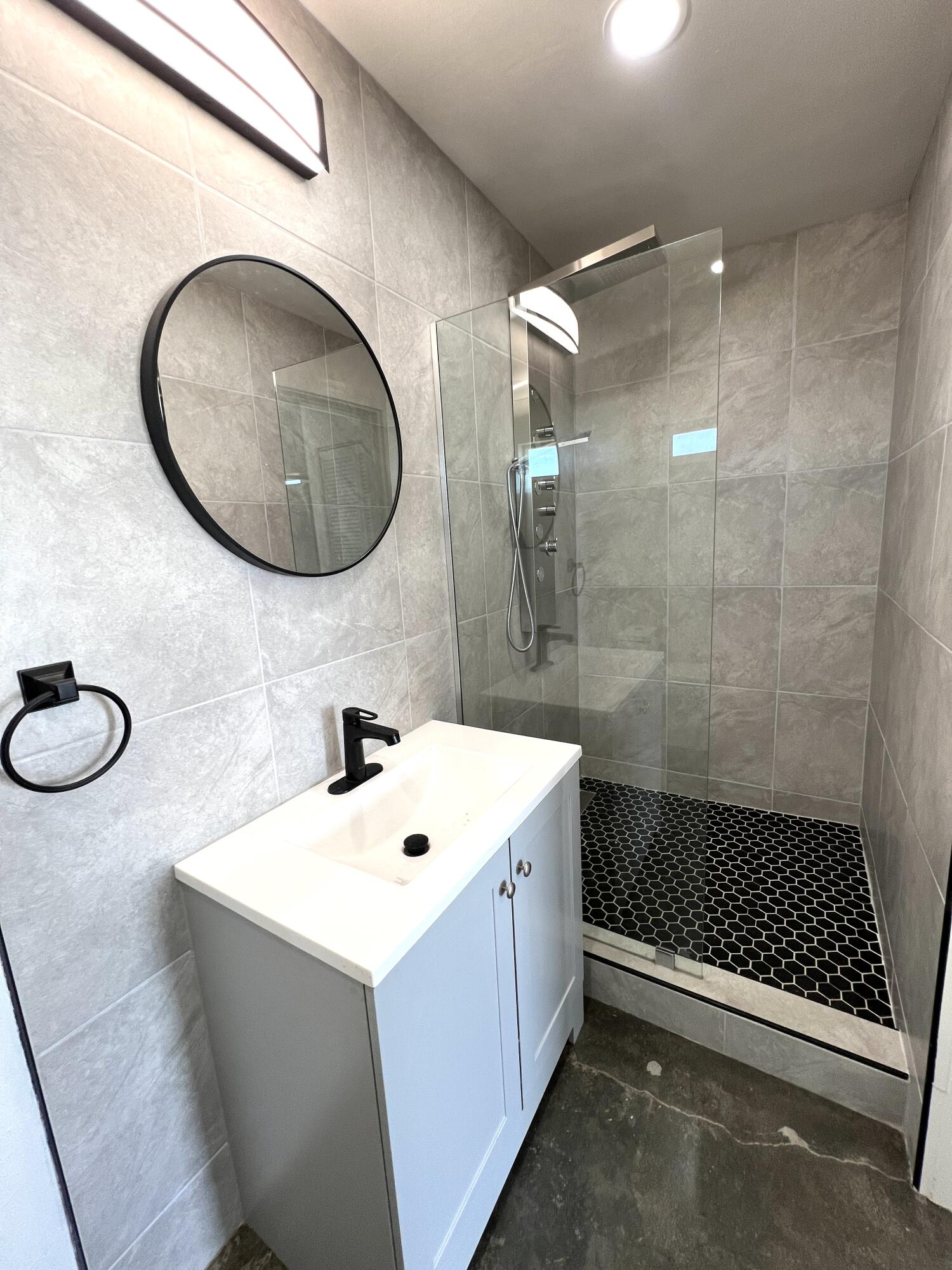 2774 Kickapoo Trail Landers, CA 92285 - Photo 17 of 51 a bathroom with a sink a toilet and a shower