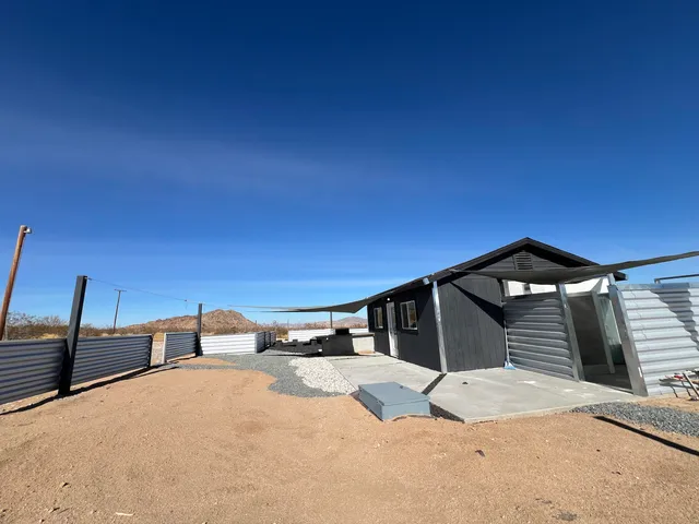 a front view of a house with parking