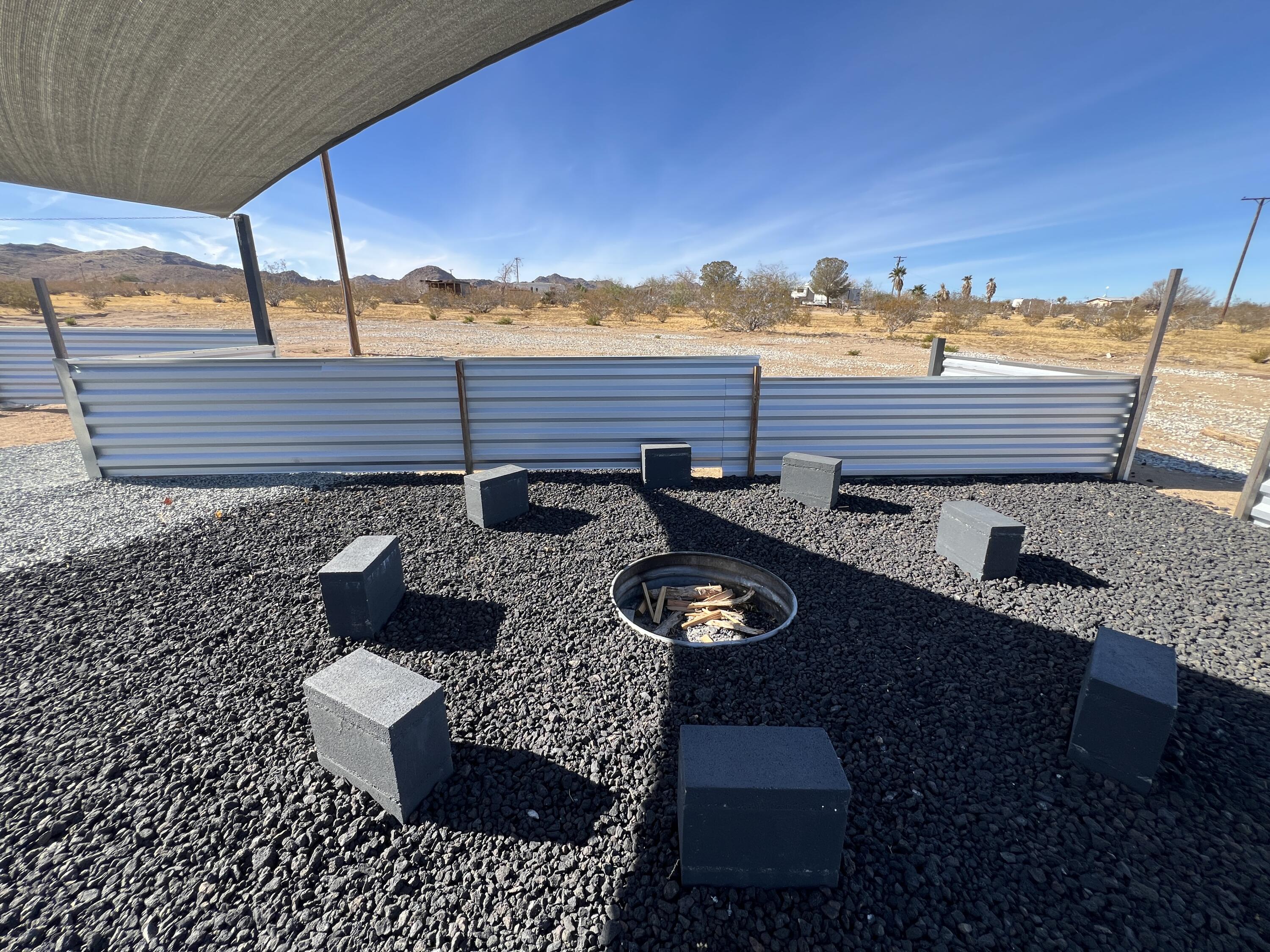 2774 Kickapoo Trail Landers, CA 92285 - Photo 23 of 51 a view of a terrace with seating space