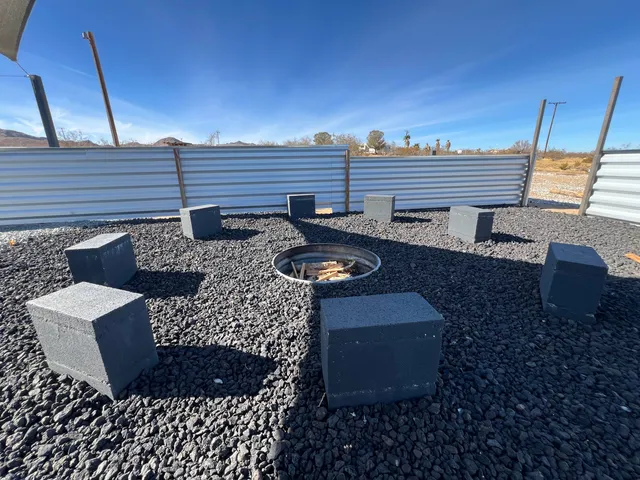 a living room with a couch and dresser