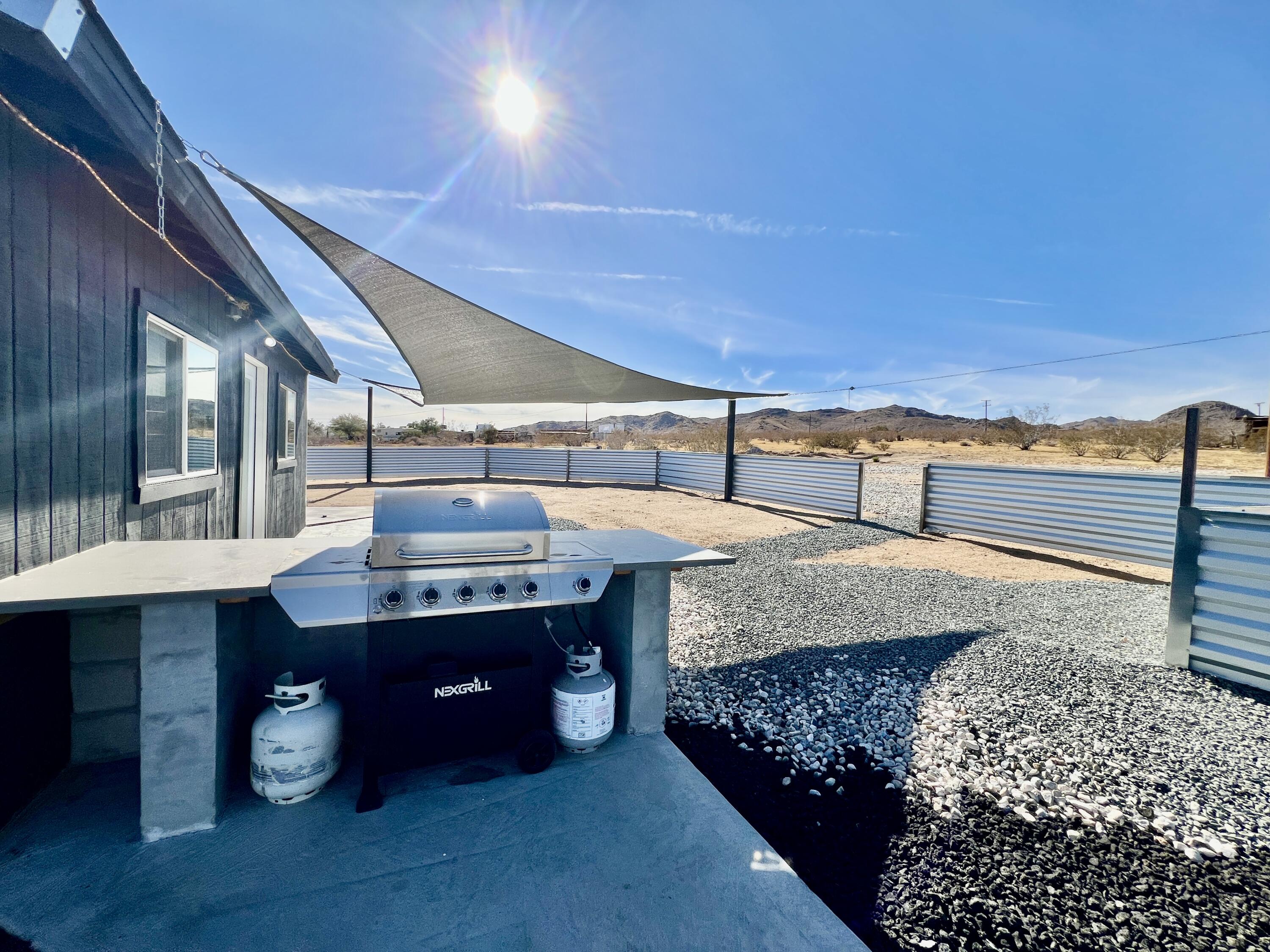 2774 Kickapoo Trail Landers, CA 92285 - Photo 25 of 51 a living room with a couch and dresser