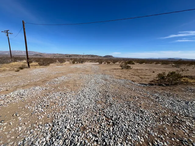 a view of a terrace with a ocean