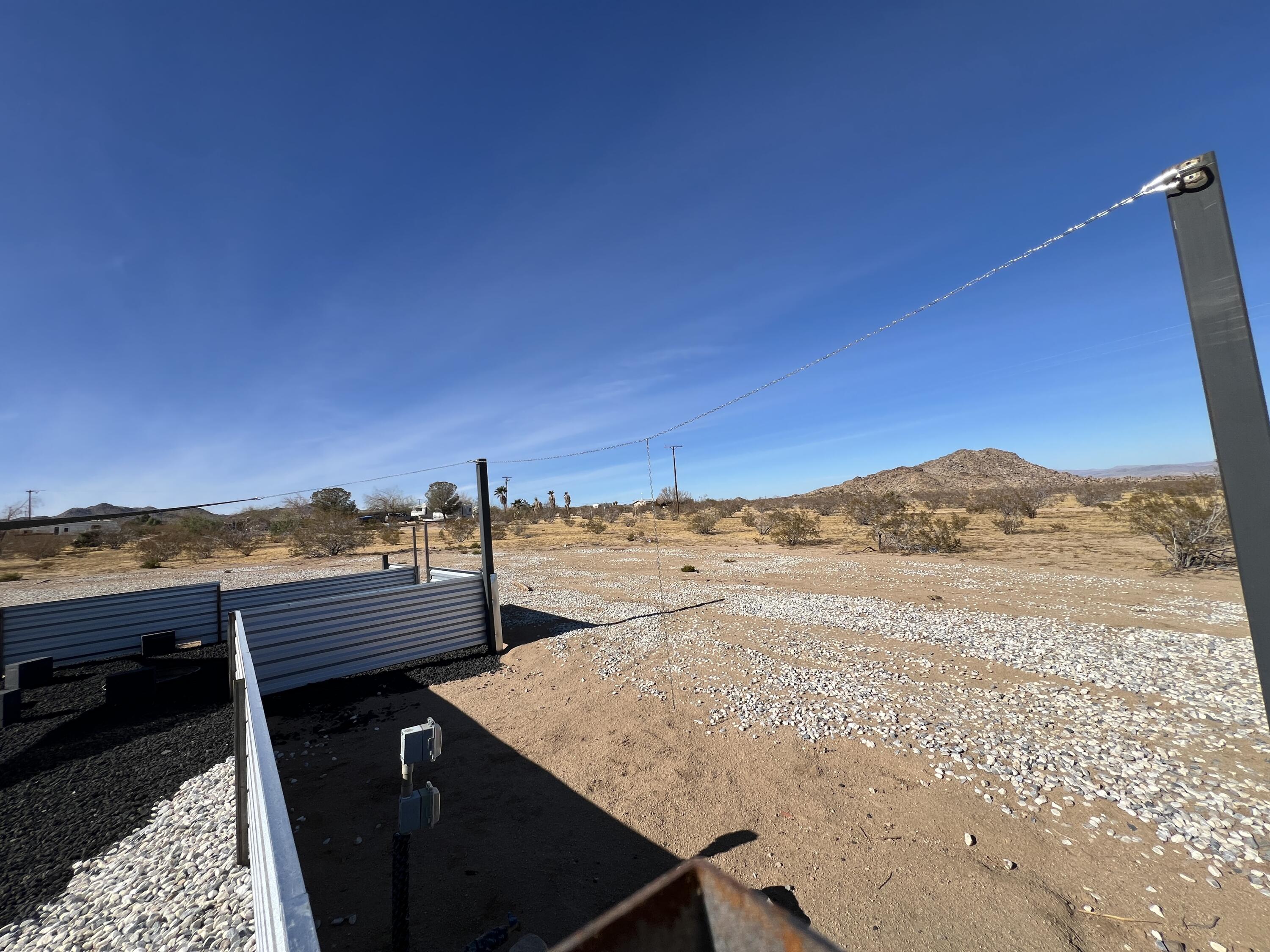 2774 Kickapoo Trail Landers, CA 92285 - Photo 35 of 51 a view of a terrace with mountain view