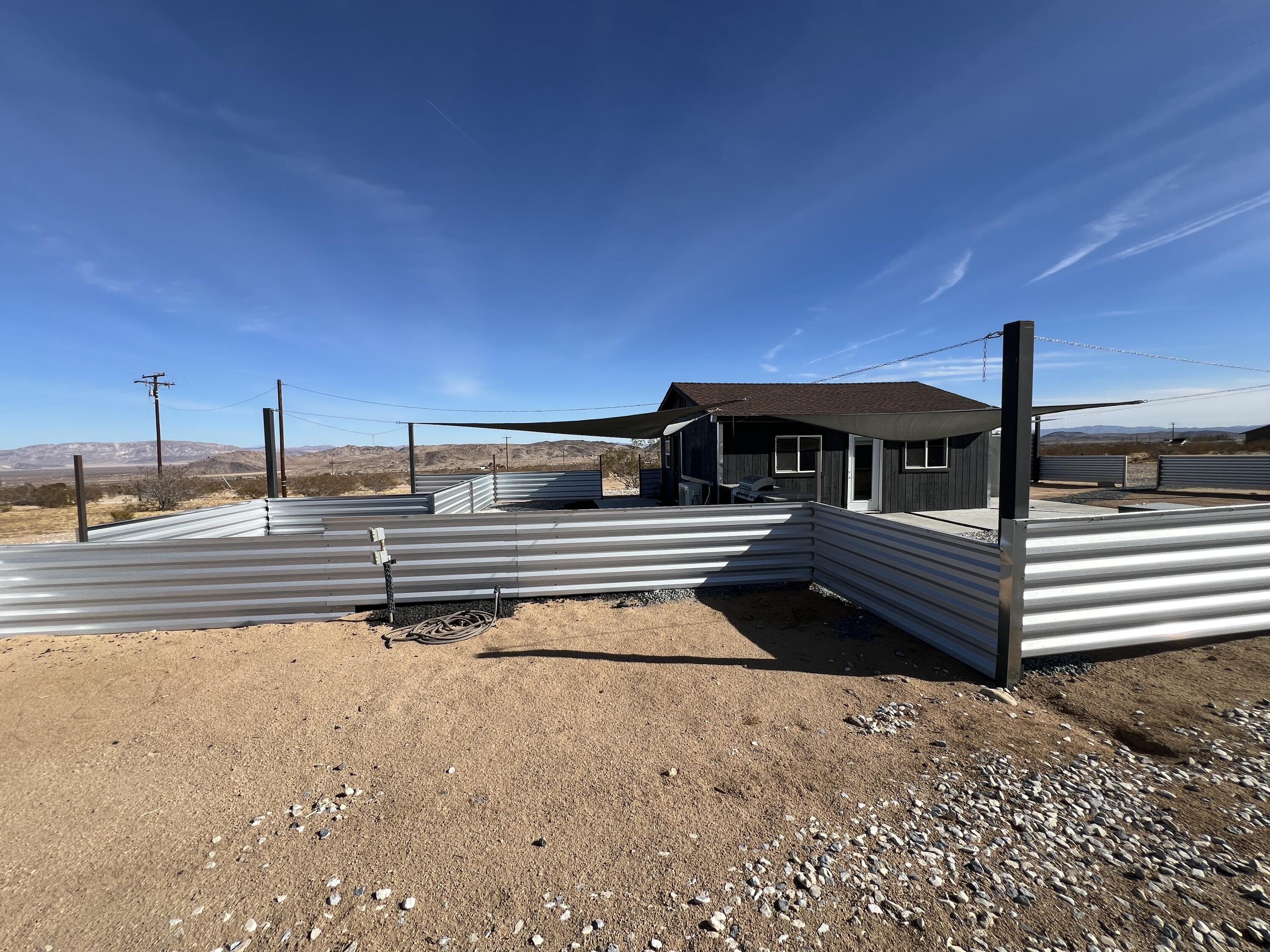 2774 Kickapoo Trail Landers, CA 92285 - Photo 45 of 51 a view of a balcony with two chairs