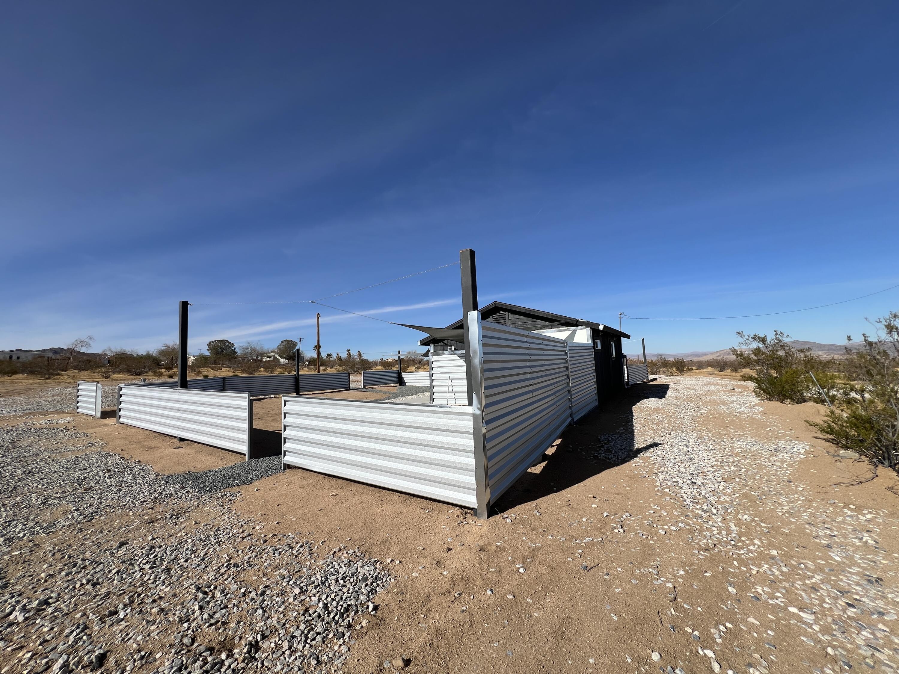 2774 Kickapoo Trail Landers, CA 92285 - Photo 50 of 51 a view of a terrace with a bench